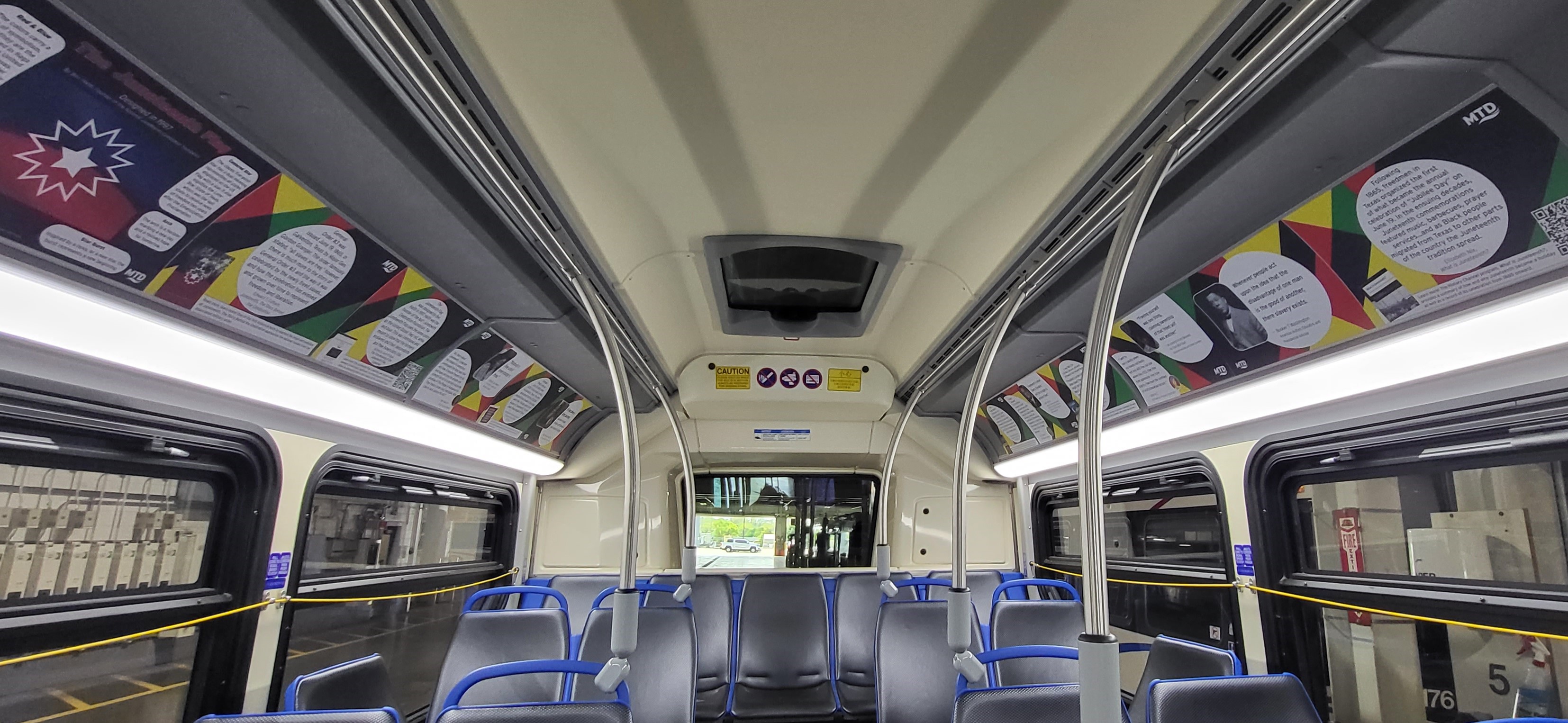 Dozens of posters fill the inside of the Juneteenth Bus with facts and quotes about the holiday.