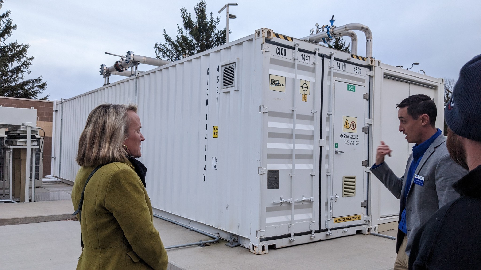 Representative Nikki Budzinski (left) visiting MTD's hydrogen fuel production facility in early 2023.