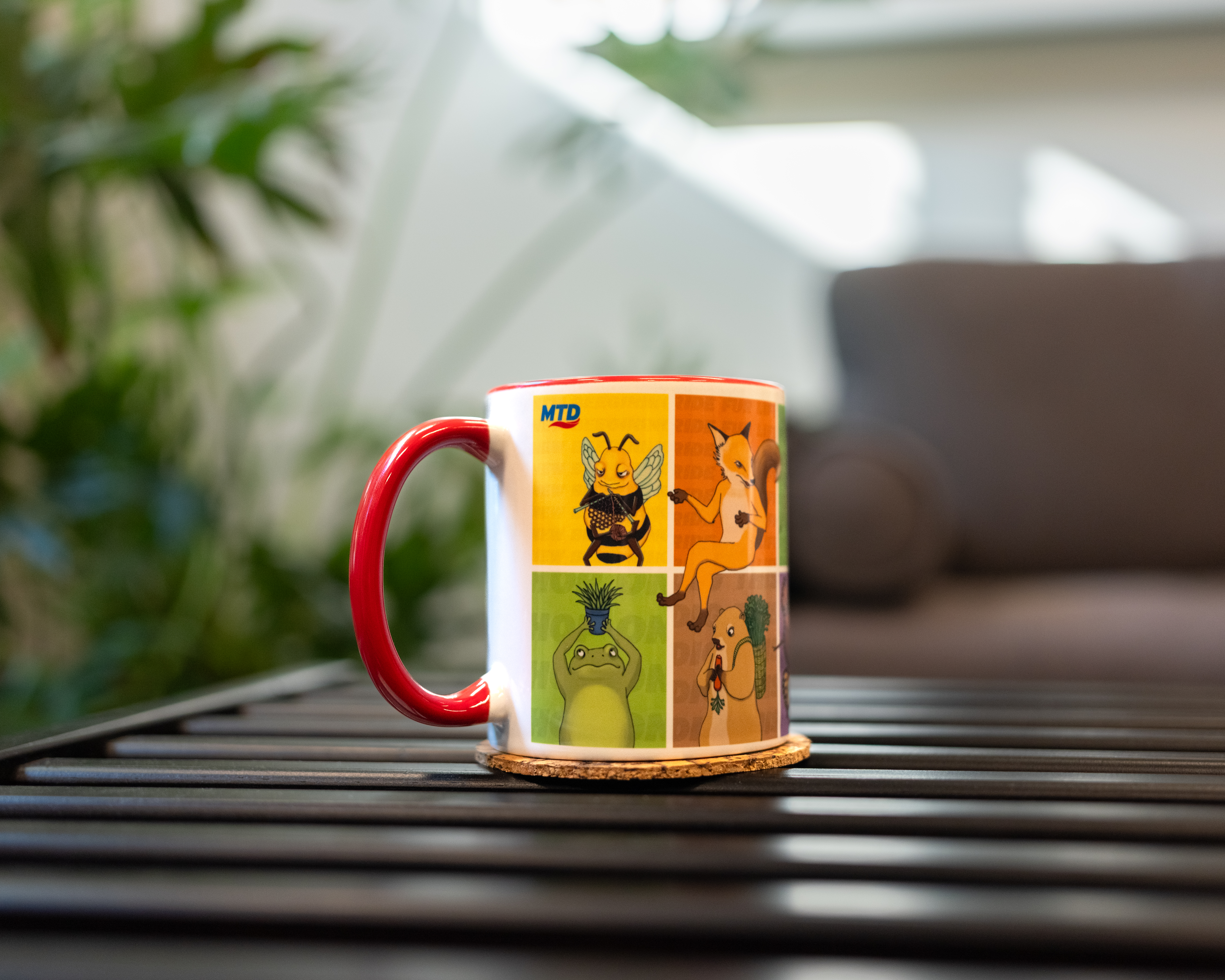 A t-shirt from the MTD merch store. It has an image of a preying mantis from the EKAH collection.