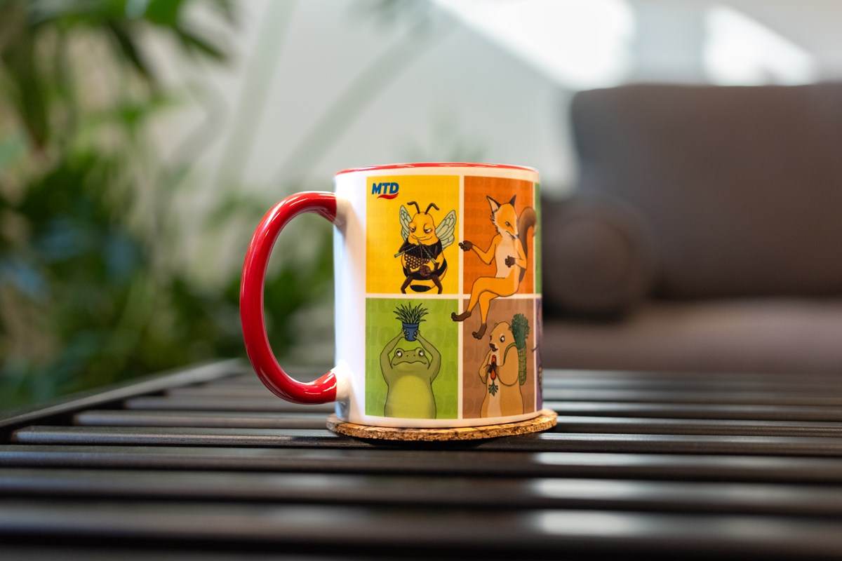 A t-shirt from the MTD merch store. It has an image of a preying mantis from the EKAH collection.